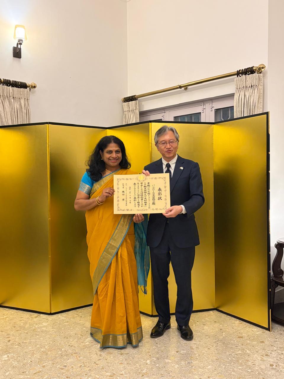 BNK representative receiving the Commendation certificate from the Consulate-General of Japan in Bengaluru